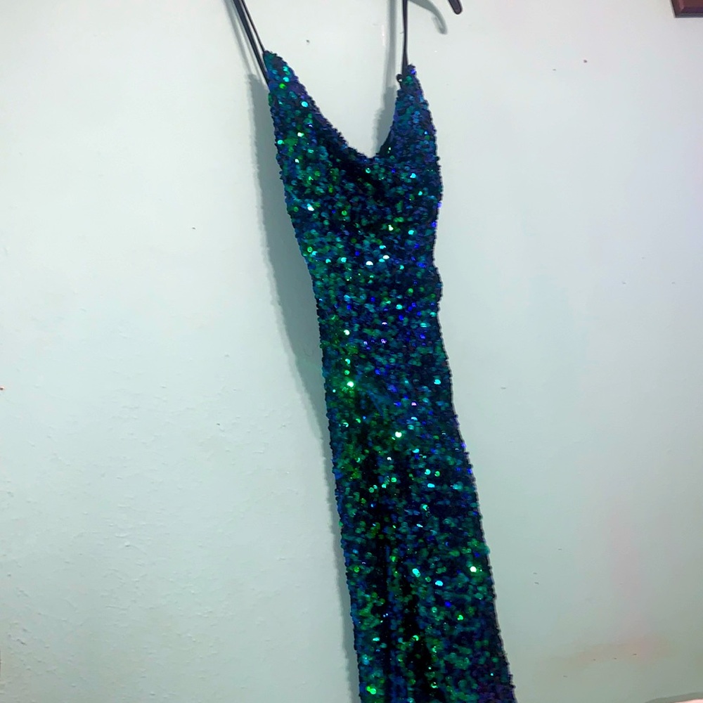 San Francisco Brand, black blue and green sequence. Never worn.